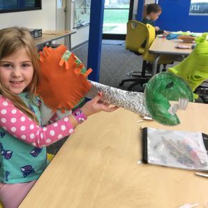 Kindergarten students create dinosaurs in Discovery Hall 11-12-18